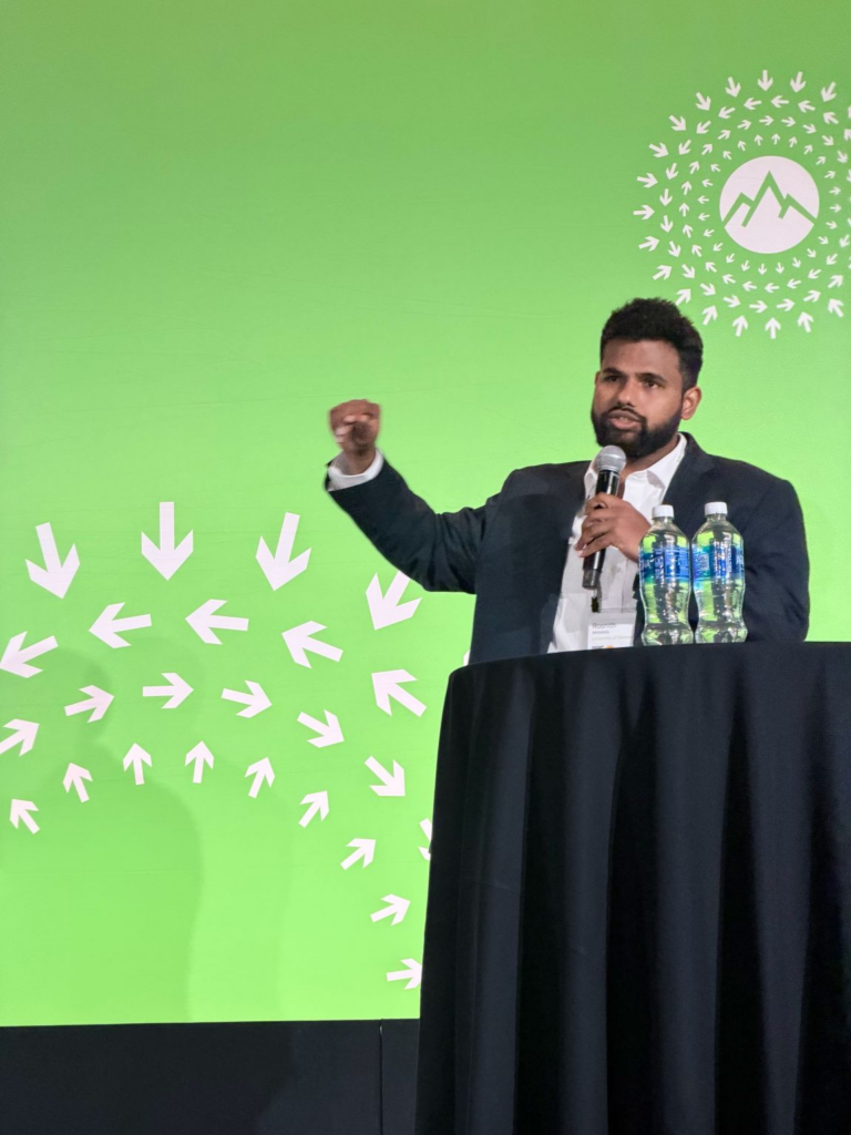 Roshith Mittakolu presenting at the 2026 OCP Global Summit in San Jose, California.